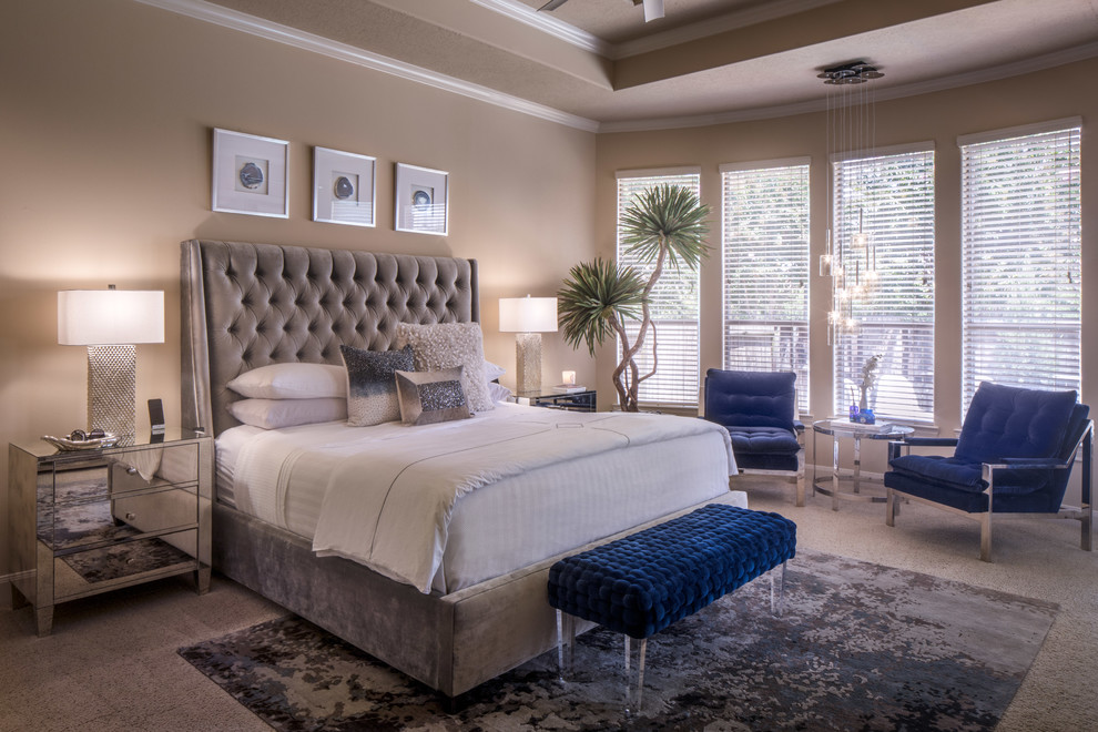 Example of a large transitional master carpeted and beige floor bedroom design in Houston with beige walls and no fireplace