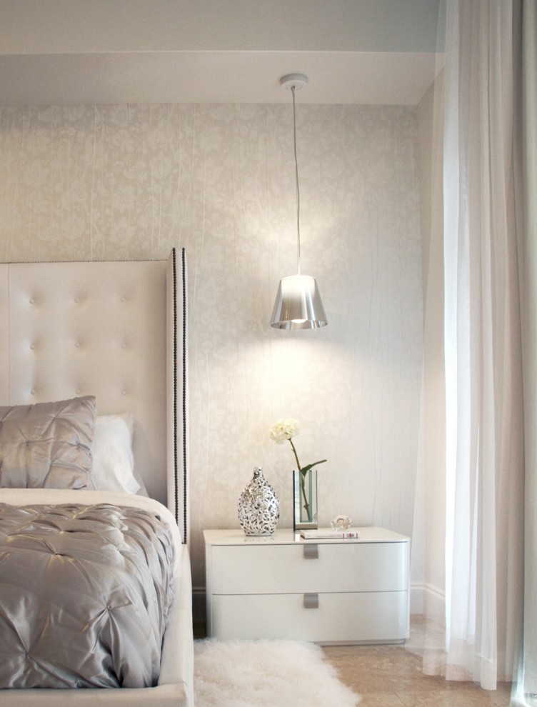 Bedroom - contemporary bedroom idea in Miami with gray walls