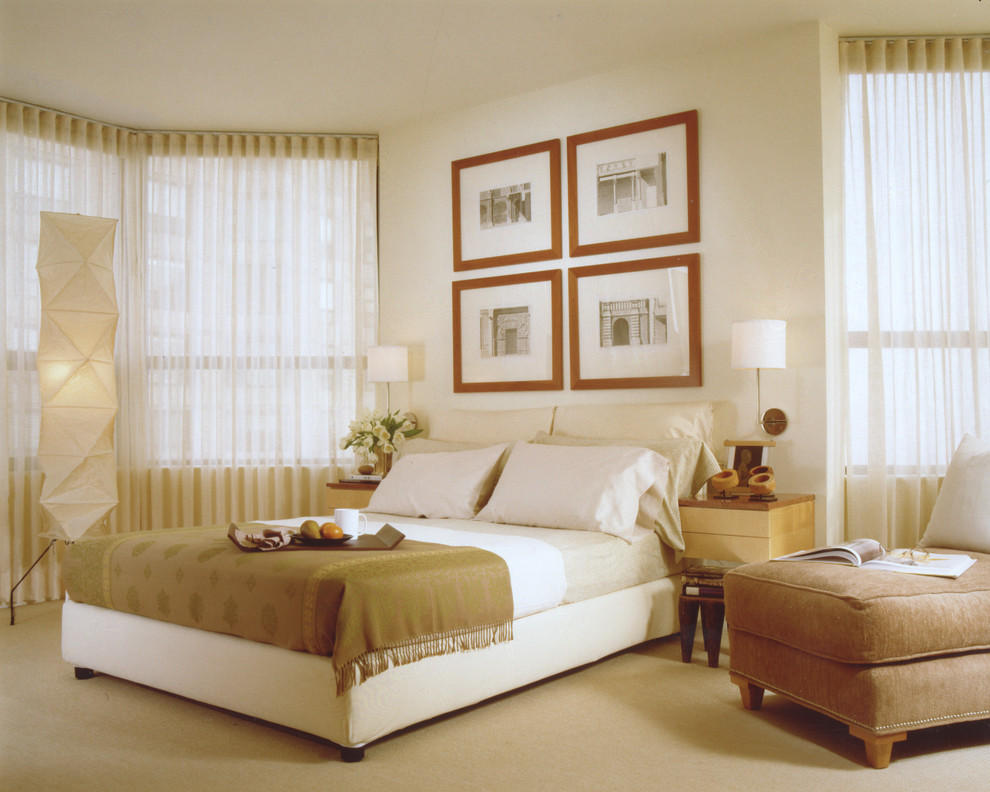 Cette image montre une chambre avec moquette design avec un mur blanc.