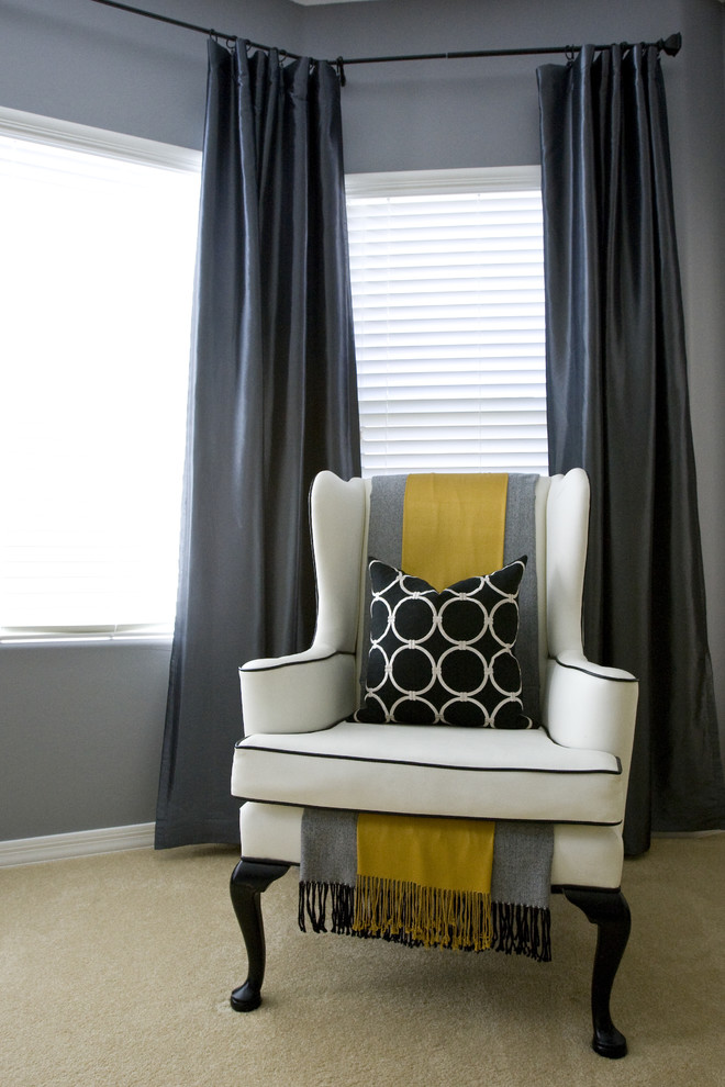 This is an example of a contemporary grey and yellow bedroom in Salt Lake City with grey walls and carpet.