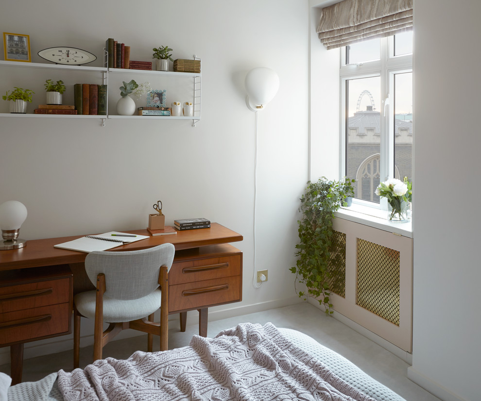 ロンドンにある小さな北欧スタイルのおしゃれな主寝室 (白い壁、カーペット敷き)