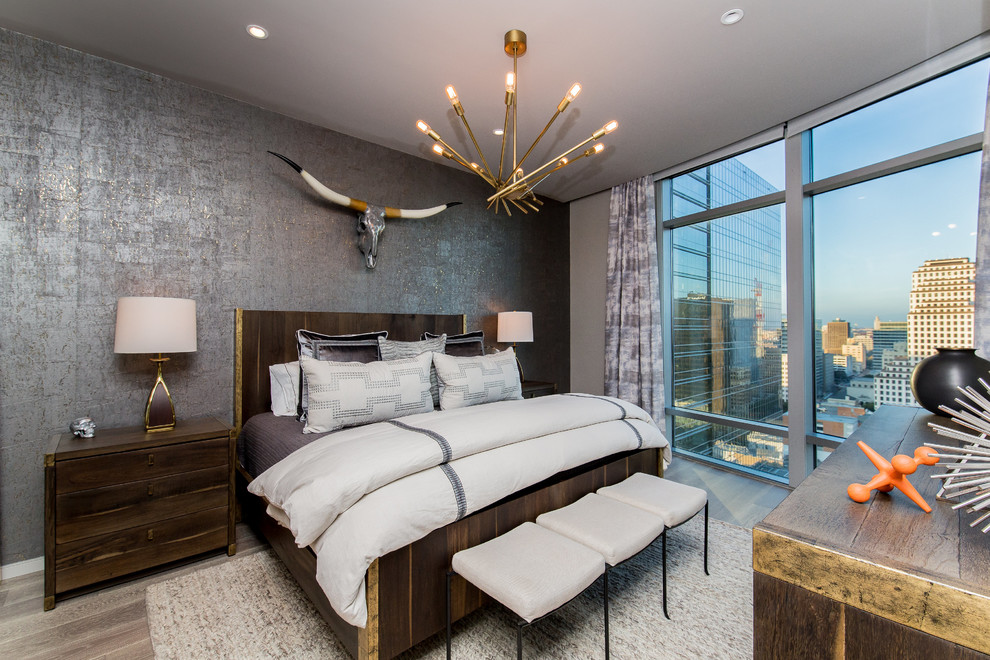 Inspiration for a mid-sized contemporary bedroom remodel in Austin with gray walls