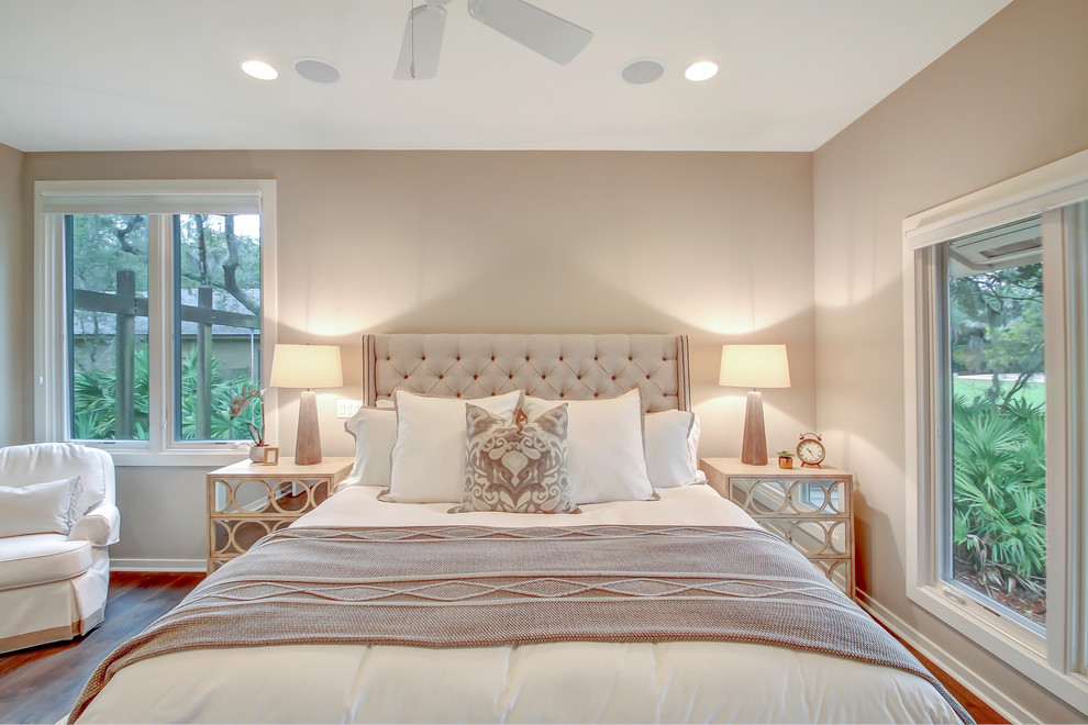 Inspiration for a mid-sized transitional master medium tone wood floor bedroom remodel in Jacksonville with gray walls and no fireplace