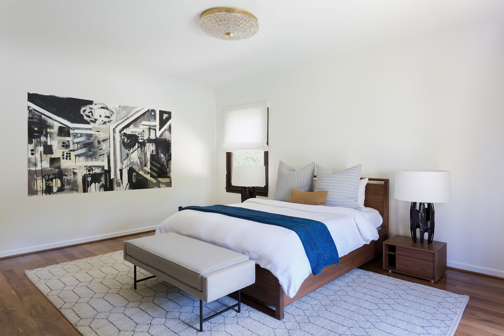 Example of a minimalist bedroom design in Los Angeles