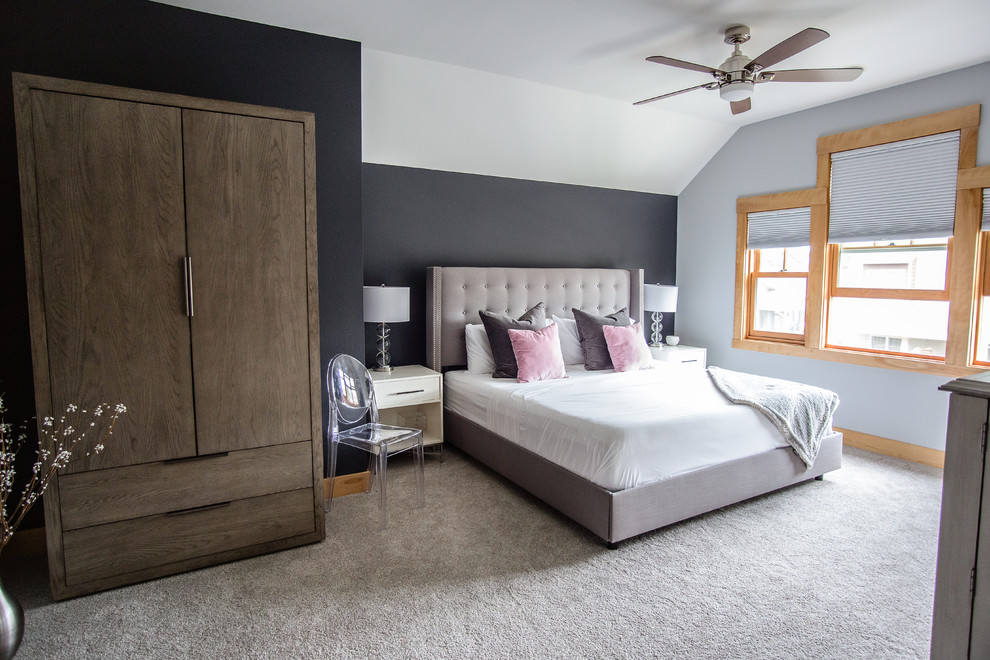 Large traditional master and grey and brown bedroom in Other with blue walls, carpet and white floors.