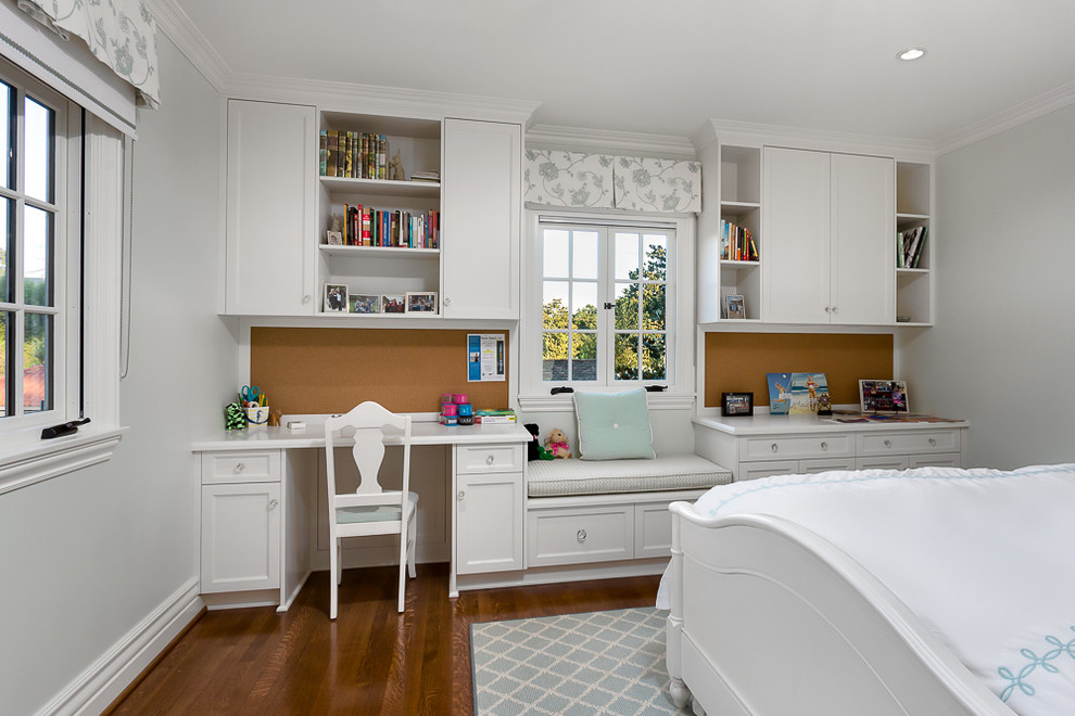 Design ideas for a classic bedroom in Los Angeles with white walls and dark hardwood flooring.