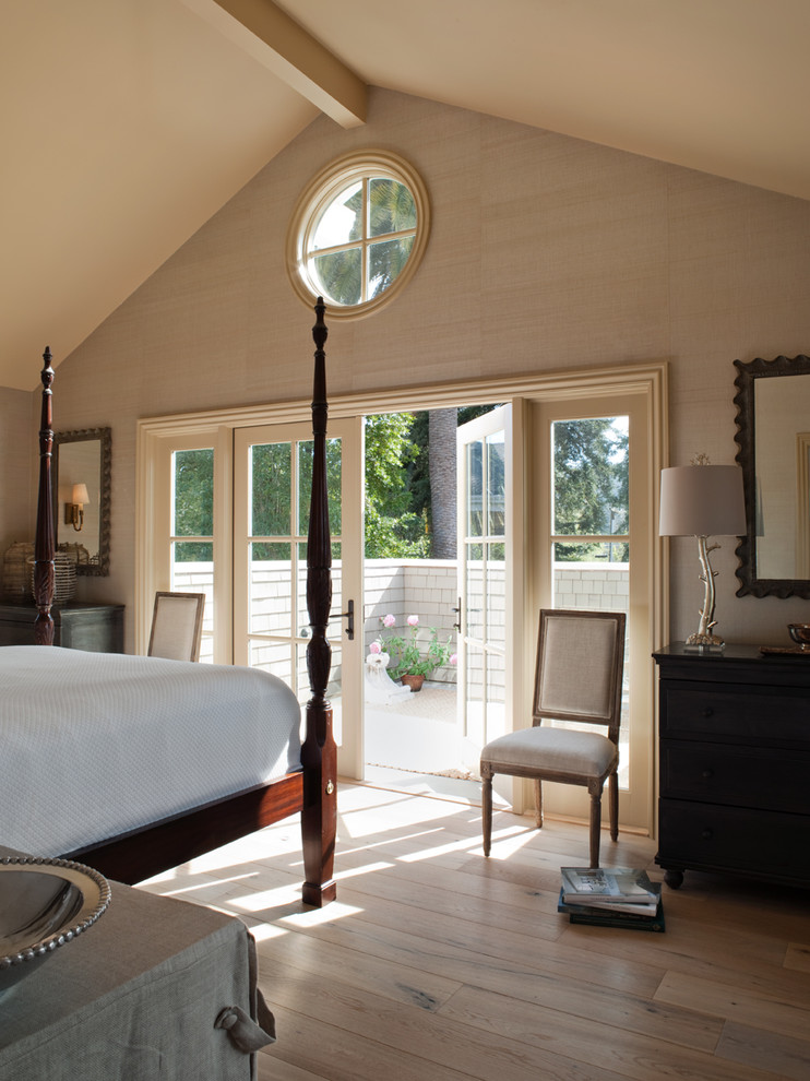Bedroom - traditional medium tone wood floor bedroom idea in San Francisco with beige walls