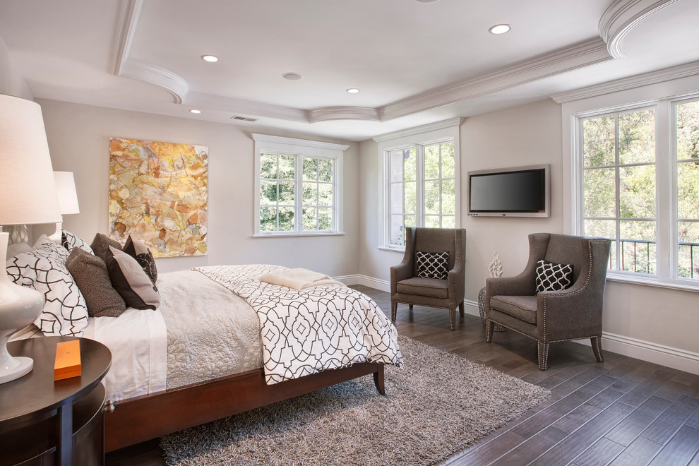 Example of a classic dark wood floor and brown floor bedroom design in San Francisco with gray walls