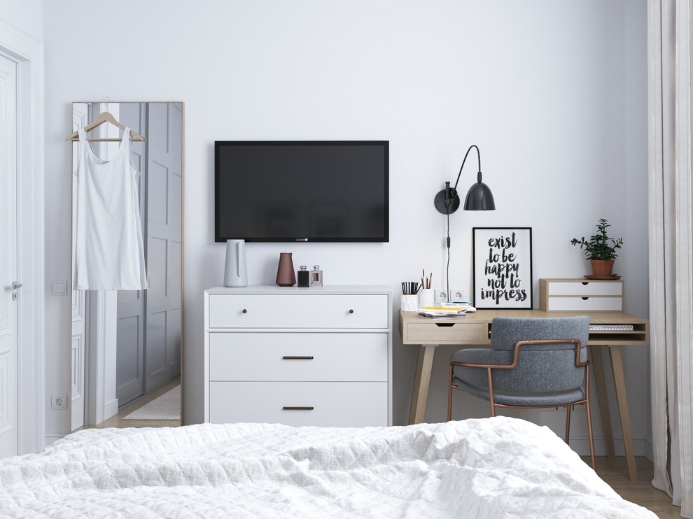 Small scandinavian master bedroom in Other with white walls and light hardwood flooring.