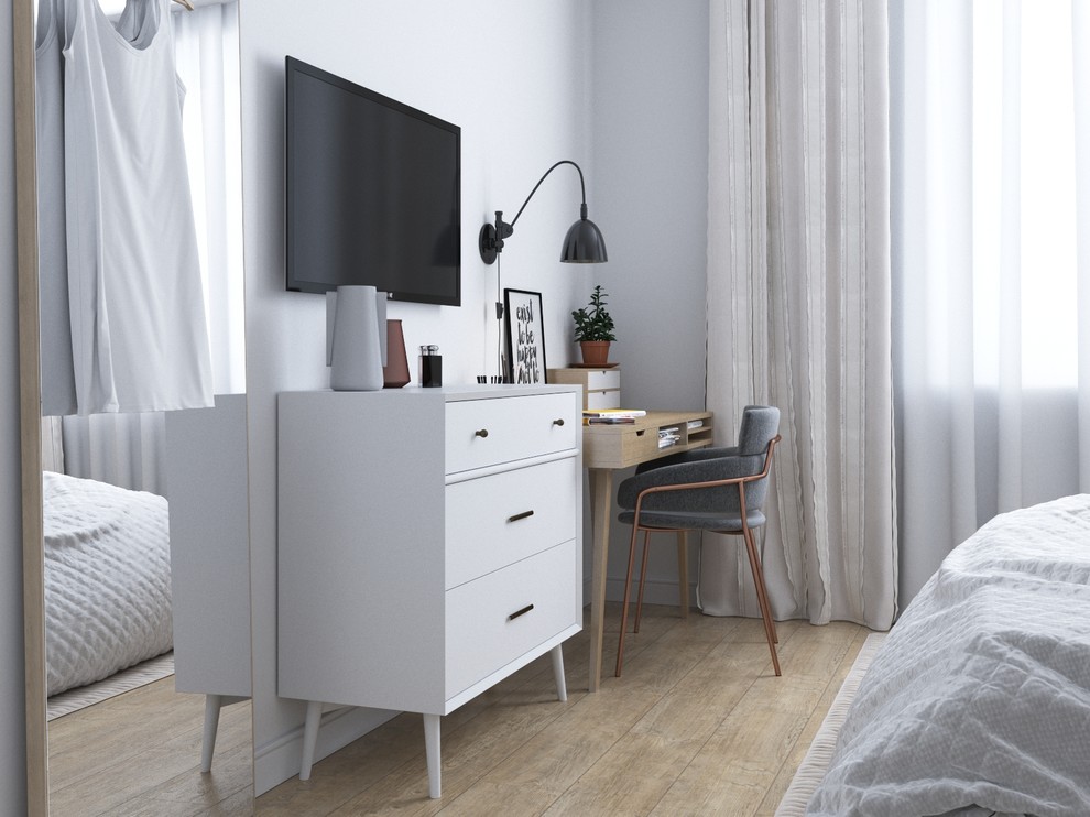 Bedroom - small scandinavian master light wood floor bedroom idea in Other with white walls