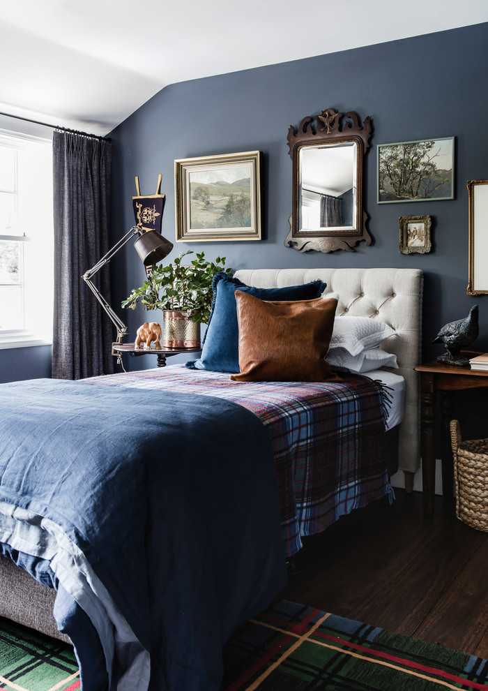 Bedroom - large traditional guest dark wood floor bedroom idea in Sydney with blue walls