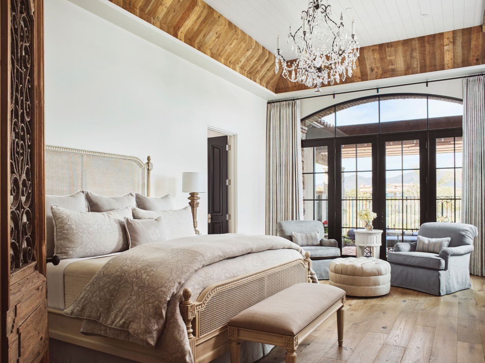 Photo of a mediterranean bedroom in Phoenix with a wood ceiling.