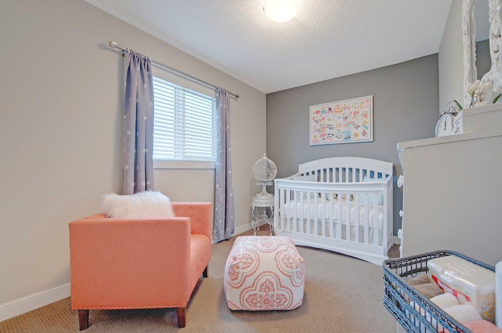 Inspiration for a medium sized classic nursery in Edmonton with blue walls and carpet.