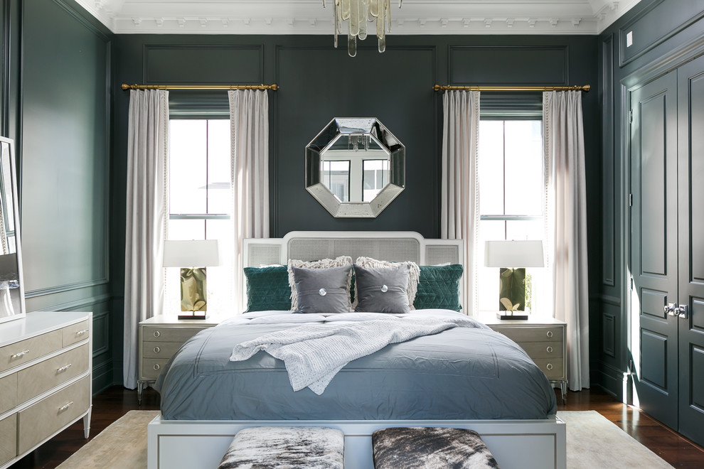 Inspiration for a mid-sized transitional master medium tone wood floor and brown floor bedroom remodel in Louisville with green walls