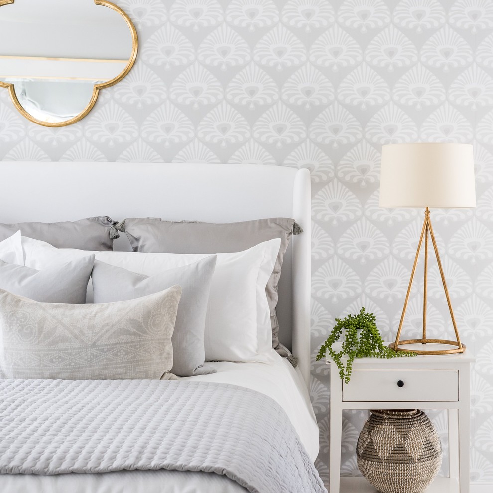 Example of a transitional bedroom design in Other with gray walls