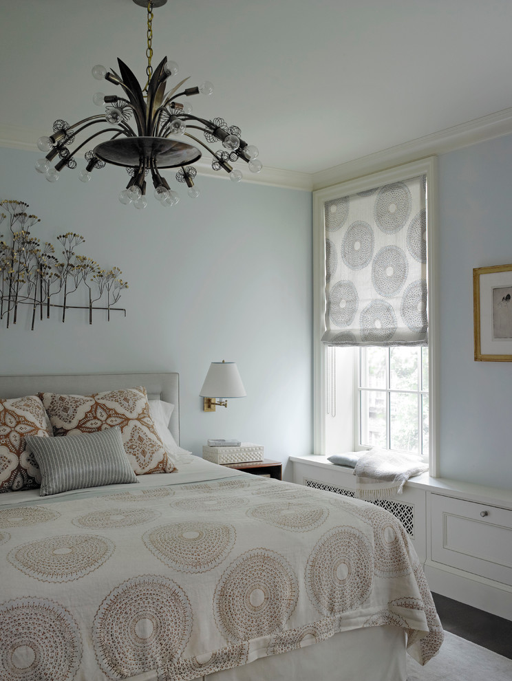 Bedroom - modern bedroom idea in New York with blue walls