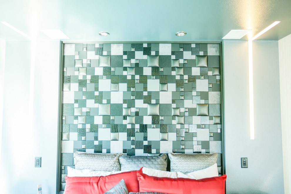Imagen de habitación de invitados minimalista de tamaño medio con paredes grises