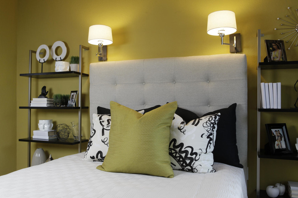 Bedroom - small modern guest bedroom idea in Atlanta with yellow walls