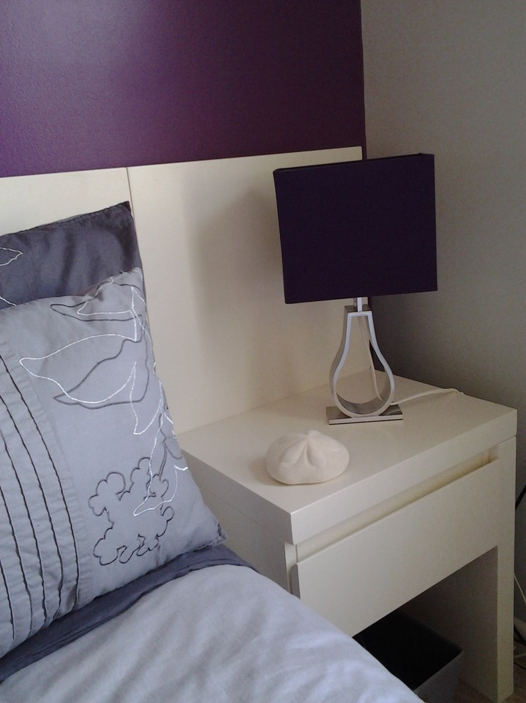 Photo of a medium sized classic guest bedroom in Orlando with purple walls, no fireplace and carpet.