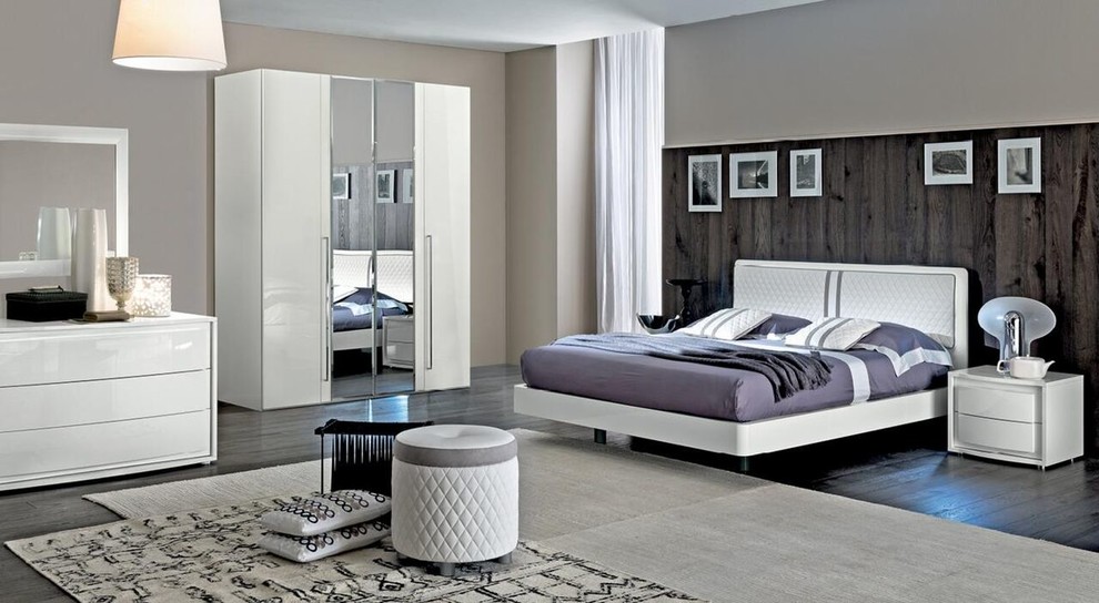 Example of a minimalist bedroom design in Toronto