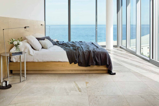 Modern bedroom with soft white stone look porcelain tile floors ...