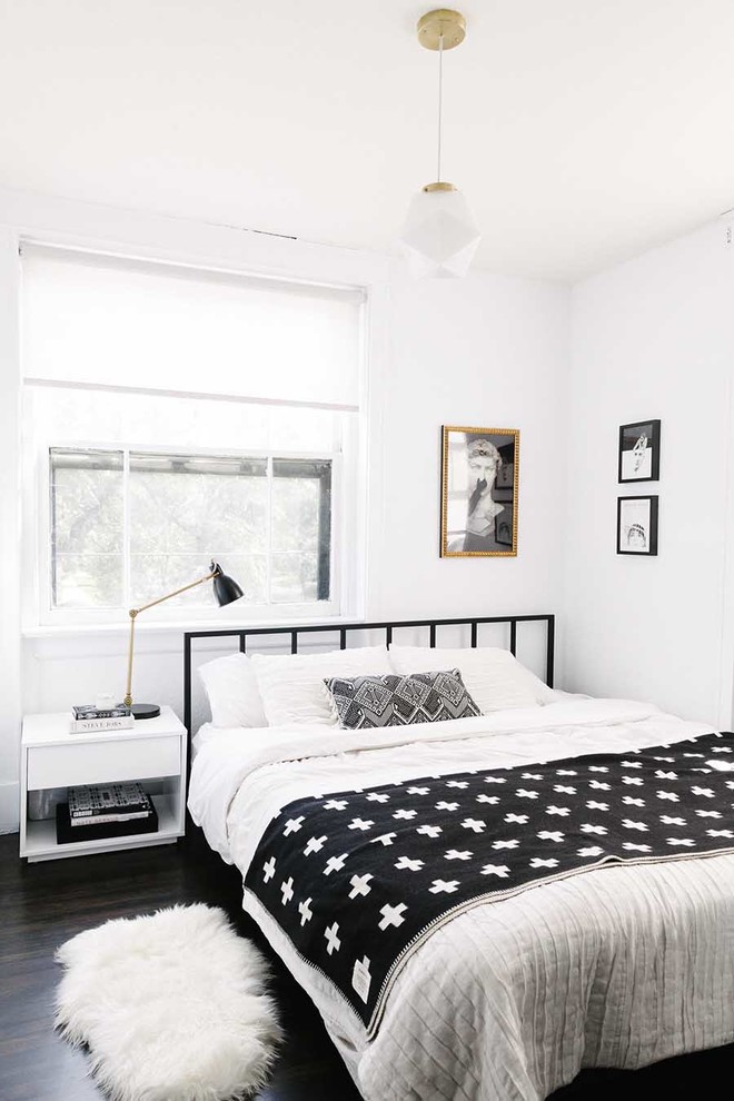 Example of a mid-sized danish guest bedroom design in Boston with white walls