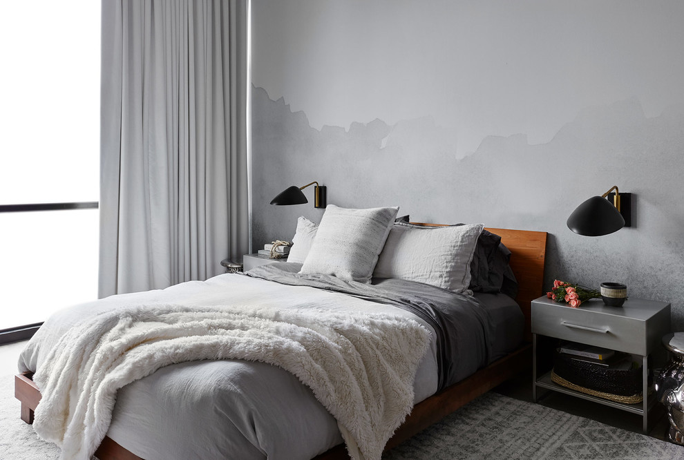 Example of a mid-sized trendy master bedroom design in Chicago with gray walls and no fireplace