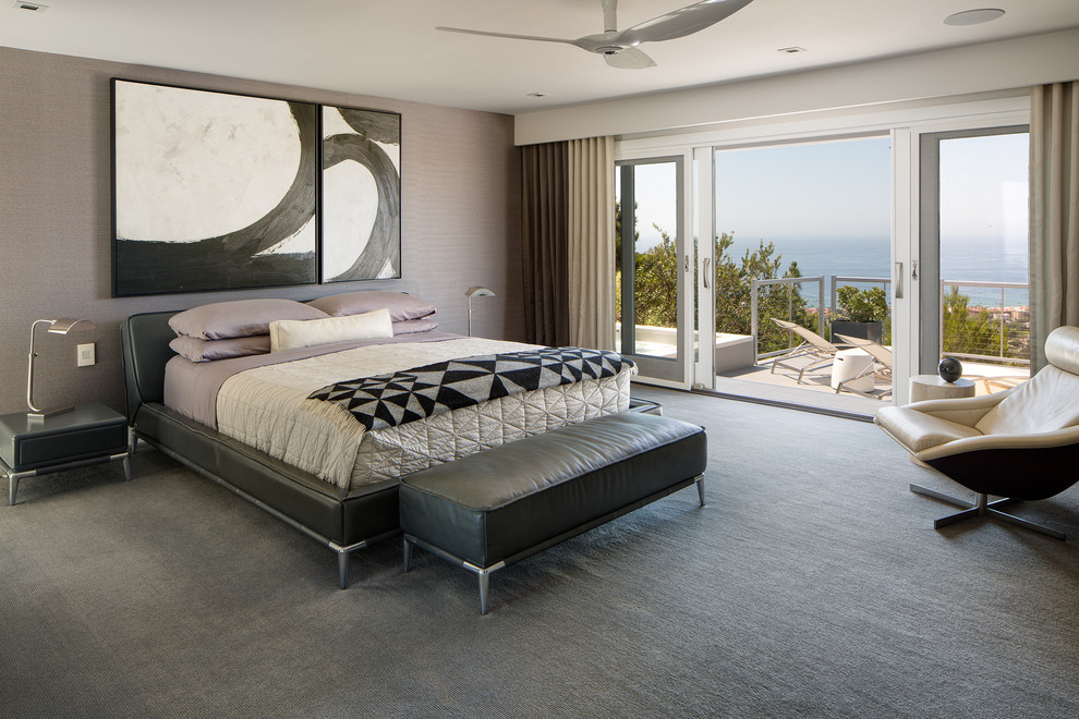 Trendy carpeted and gray floor bedroom photo in San Diego with gray walls