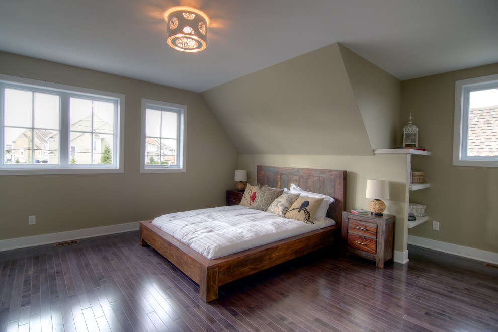 Bedroom - large farmhouse master dark wood floor bedroom idea in Montreal with beige walls