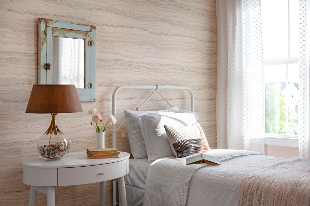 Inspiration for a mid-sized cottage guest dark wood floor and brown floor bedroom remodel in DC Metro with pink walls