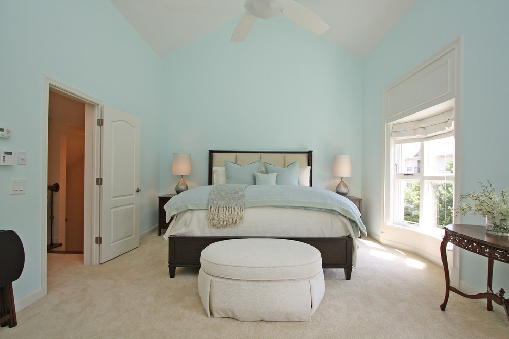 Example of a large classic master carpeted and brown floor bedroom design in Atlanta with blue walls and no fireplace