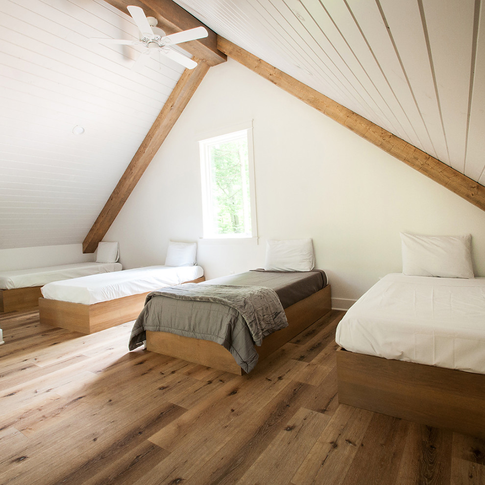 На фото: спальня среднего размера в стиле модернизм с белыми стенами, полом из винила и коричневым полом