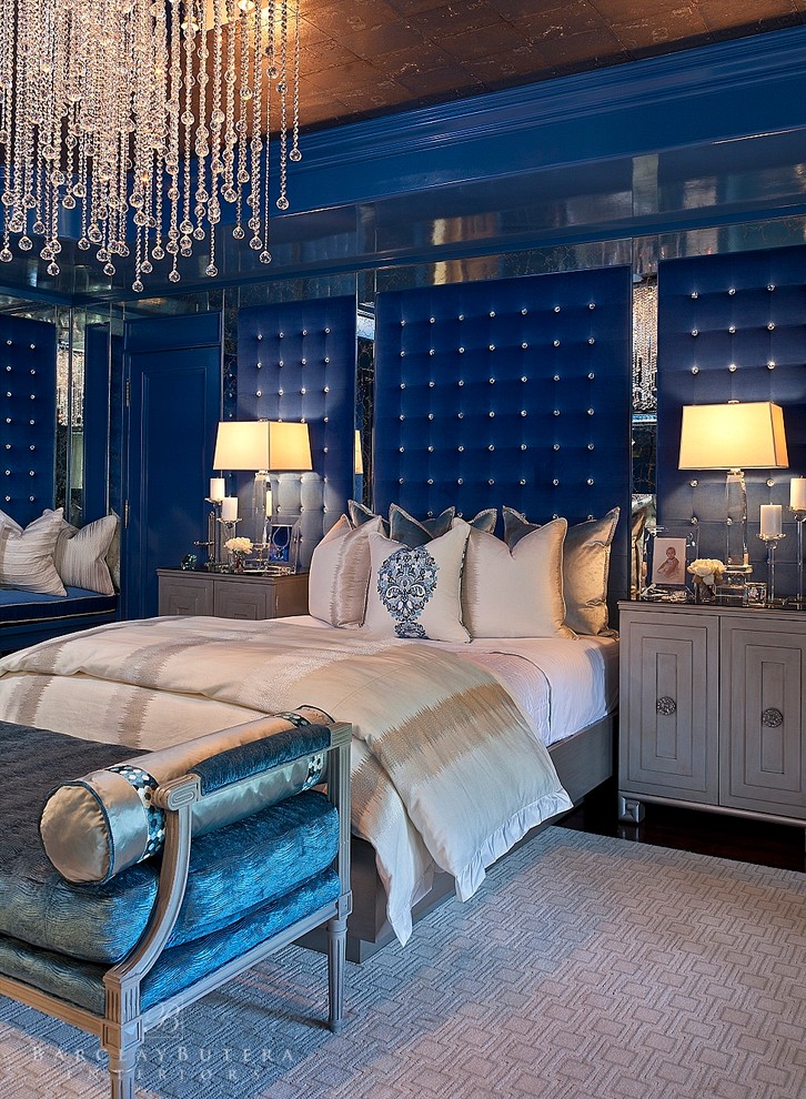 Example of an eclectic master dark wood floor bedroom design in Orange County with blue walls