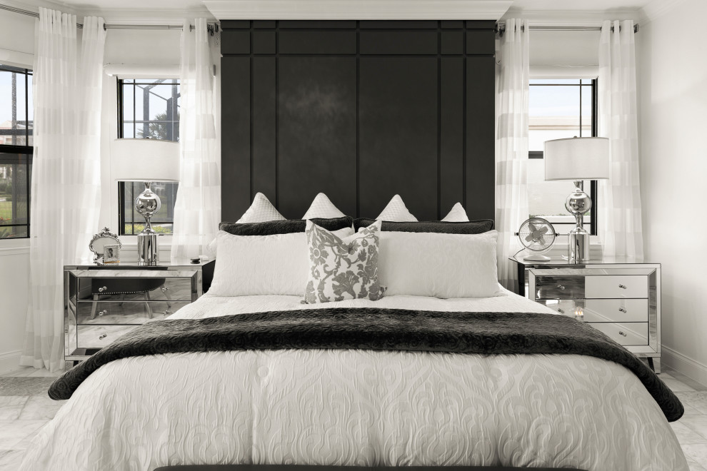 На фото: большая хозяйская спальня в стиле модернизм с черными стенами и мраморным полом