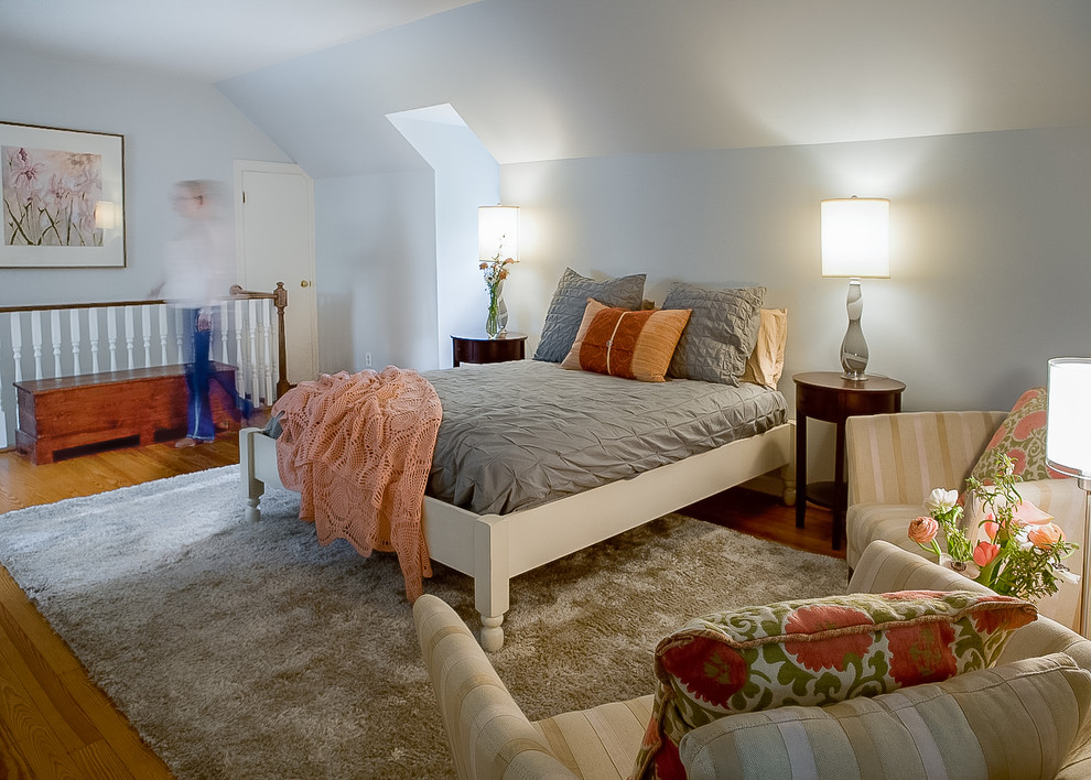 Bedroom - transitional master light wood floor and brown floor bedroom idea in Nashville with white walls