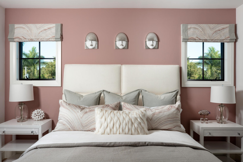 Design ideas for a contemporary bedroom in Miami with pink walls.