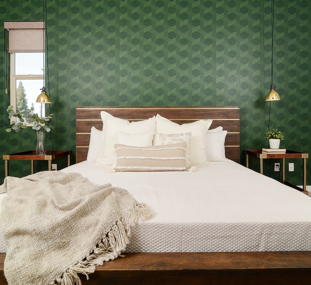 This is an example of a contemporary bedroom in Sacramento with green walls.