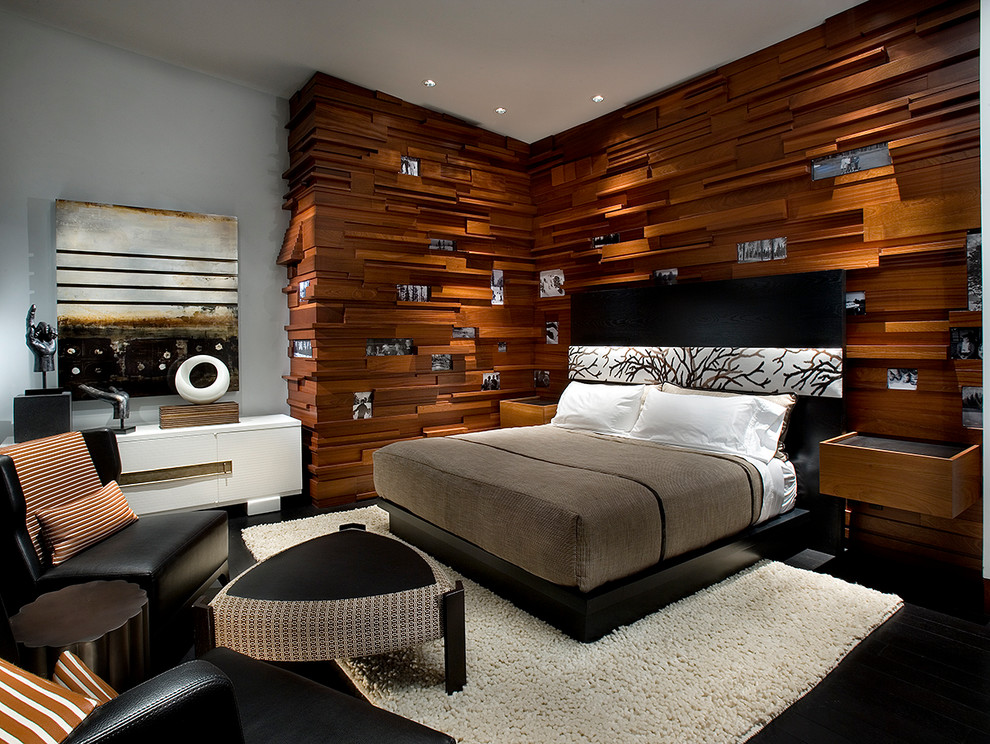Idéer för ett modernt sovrum, med grå väggar och svart golv