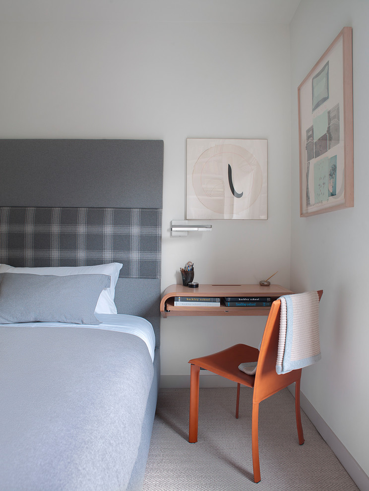 Trendy carpeted and gray floor bedroom photo in New York with white walls
