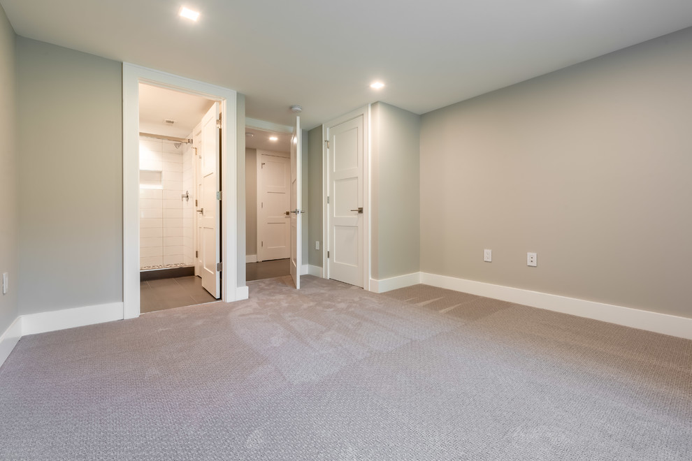 Medium sized traditional bedroom in DC Metro with grey walls, carpet, no fireplace and beige floors.