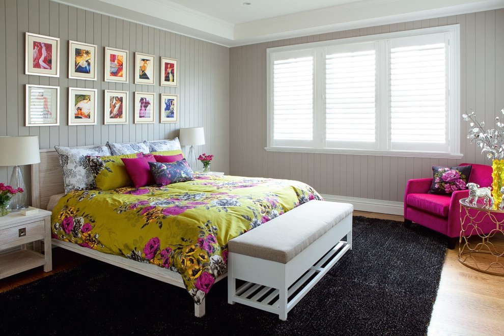 Design ideas for a traditional grey and pink bedroom in Brisbane with grey walls, light hardwood flooring and no fireplace.