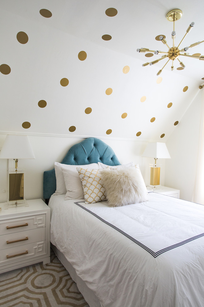 Bedroom - small transitional guest light wood floor bedroom idea in Los Angeles with white walls and no fireplace
