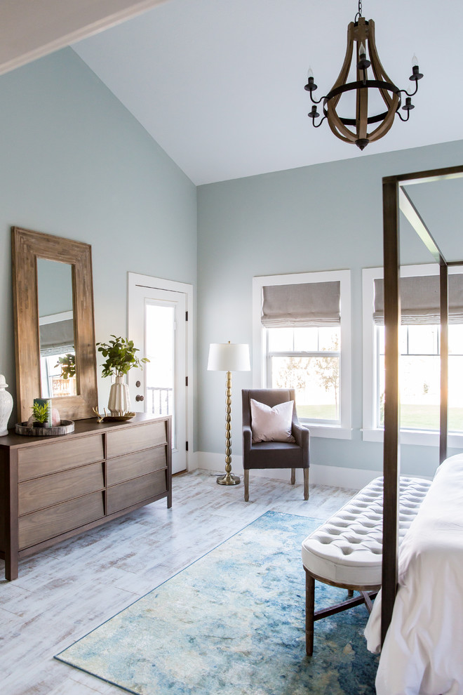 Inspiration for a large eclectic master painted wood floor bedroom remodel in Salt Lake City with green walls