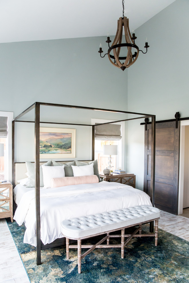 Example of a large transitional master painted wood floor bedroom design in Salt Lake City with green walls