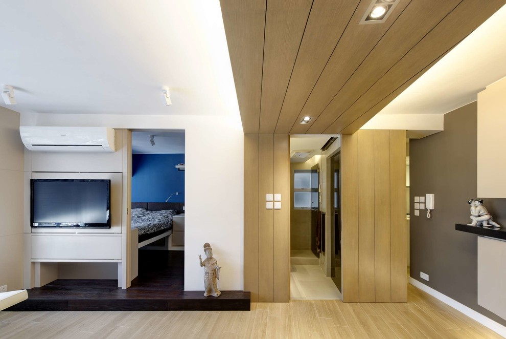 Contemporary bedroom in Hong Kong with no fireplace.
