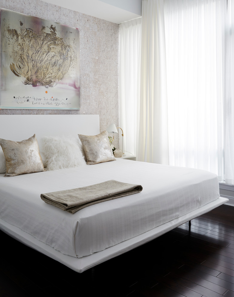 Design ideas for a contemporary master bedroom in Toronto with dark hardwood flooring.