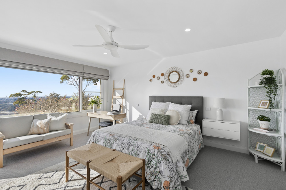 Imagen de dormitorio clásico renovado grande con moqueta y suelo gris