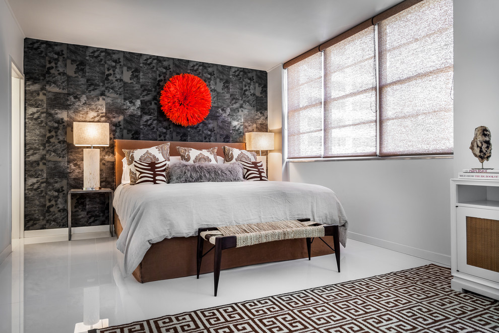 Design ideas for a contemporary master bedroom in Miami with white walls, porcelain flooring and a feature wall.