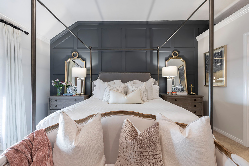 This is an example of a modern bedroom in Houston with grey walls.