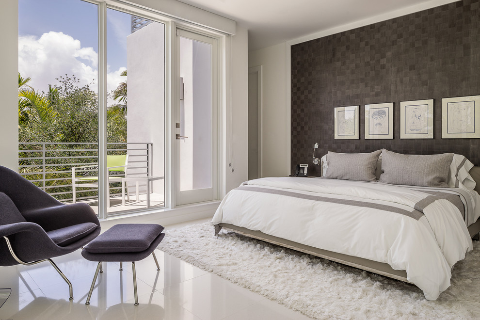 Large trendy guest porcelain tile bedroom photo in Miami with white walls and no fireplace